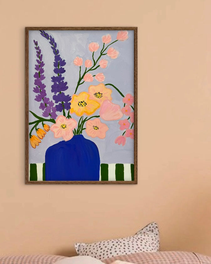 Blå vase med blomster