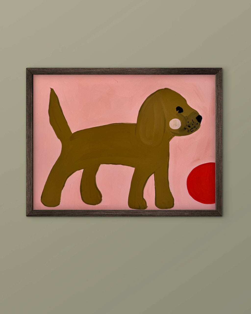 Hund med rød ball